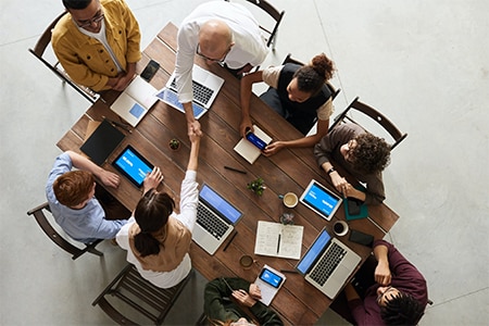 group of people around conference table