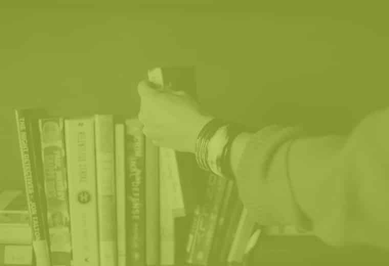 arm grabbing books