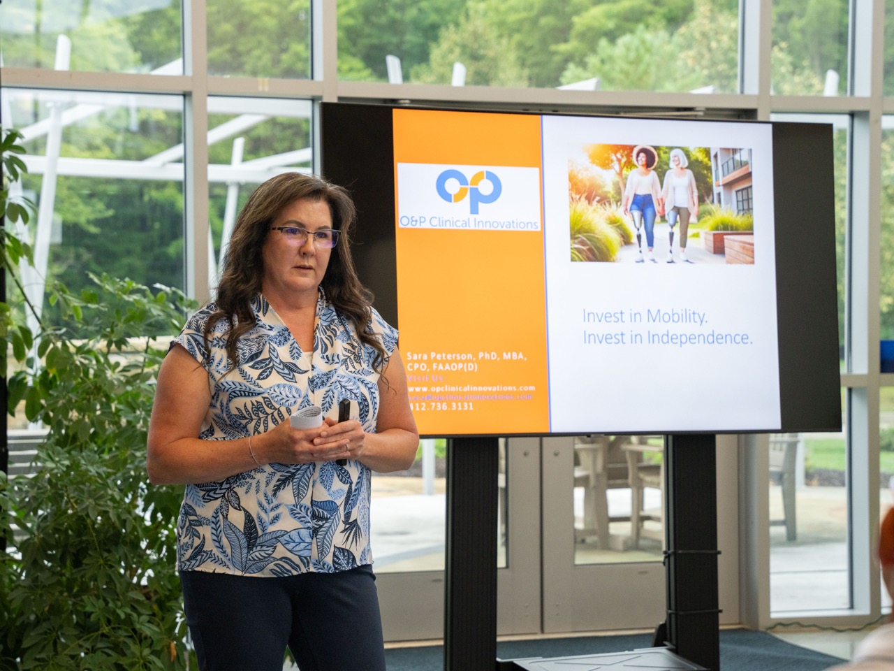 Woman presenting slides for business idea